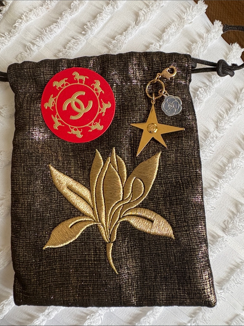CHANEL Red and Gold Logo Sticker with Gold Star and Camellia Charms